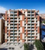RKTB Architects pushed the capability of the usual block and plank structural system to create large windows and bring in more light.