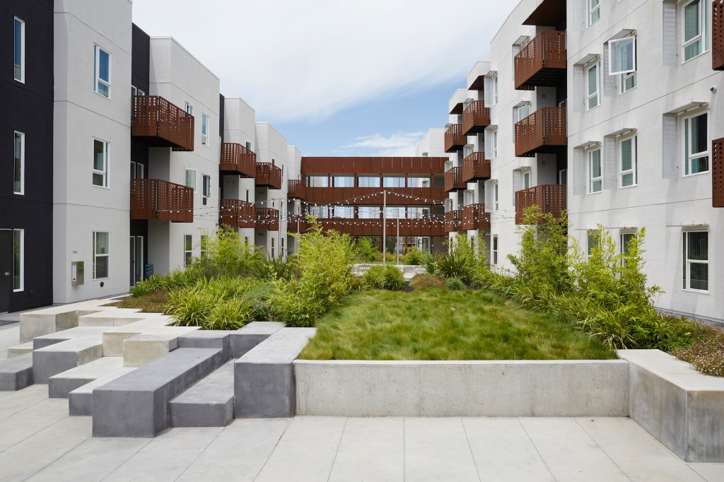 Designed by David Baker Architects, The Rivermark in West Sacramento, Calif., features a second-level podium courtyard that serves as the heart of the development. Balconies, decks, and patios surround the courtyard, which helps to blend the public and private space.