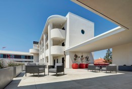 Designed by Studio E Architects and developed by Wakeland Housing and Development Corp., Talmadge Gateway in San Diego provides three stories of micro-unit residences for formerly homeless seniors.