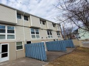 The 40-unit Fort Hill Gardens development provides affordable three-bedroom units for families in Boston. It is being preserved by Vitus.