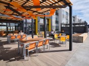 Designed by Cuningham Group, the Moline @ Stapleton Apartments in Denver features an indoor/outdoor common area. Architects says the COVID-19 pandemic is emphasizing the importance of outdoor space.