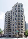 The 145-unit Commonwealth Apartments in Chicago will undergo renovations after its acquisition by Standard Communities.